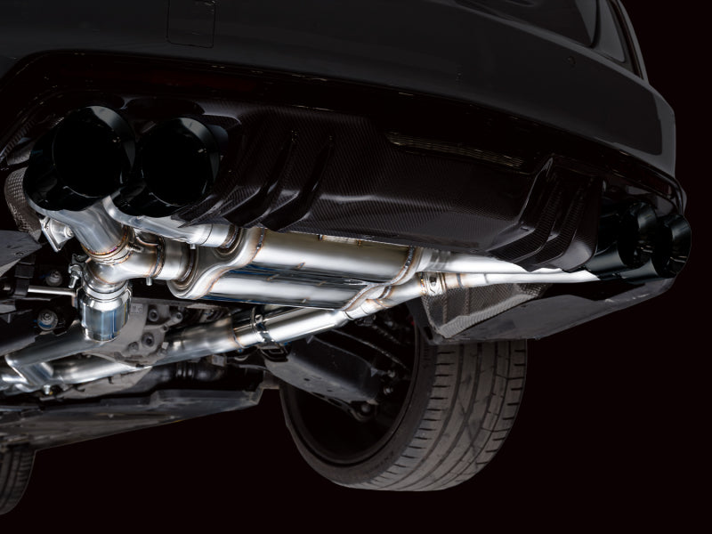 AWE SwitchPath rear mufflers and exhaust piping installed beneath the vehicle