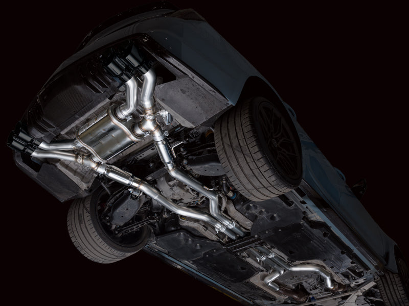 AWE 3025-43562 X-pipe and mid-pipes mounted beneath the vehicle