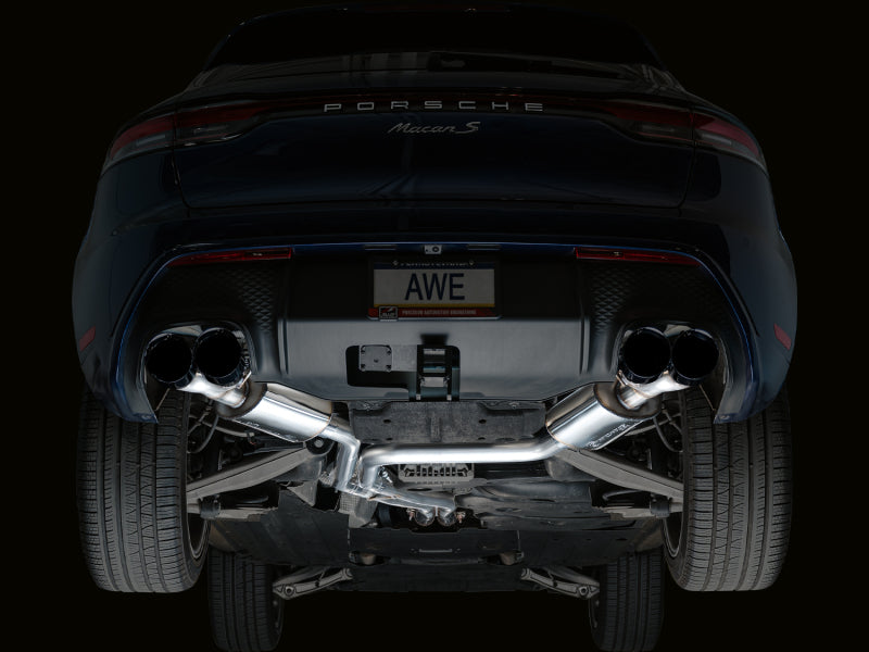 Underside view of Porsche Macan 2.9TT showing installed AWE Tuning Touring Edition Catback Exhaust with diamond black quad tips