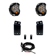 Load image into Gallery viewer, Baja Designs LP9 Series dual bumper light kit for 2021+ RAM 1500 TRX, including two LP9 Pro LED lights, mounting brackets, and wiring harness.