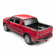 Load image into Gallery viewer, BAK BAKFlip G2 tonneau cover mounted on Chevy Silverado 1500 truck bed