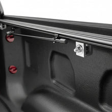 Load image into Gallery viewer, BAK BAKFlip G2 tonneau cover mounted on Chevy Silverado 1500 truck bed