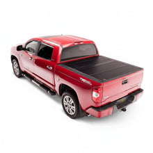 Load image into Gallery viewer, BAK BAKFlip G2 tonneau cover mounted on Honda Ridgeline truck bed