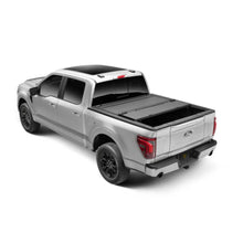 Load image into Gallery viewer, BAK 2021+ Ford F-150 Regular &amp; Super Cab BAKFlip MX4 8ft Bed Cover - Matte Finish angled view