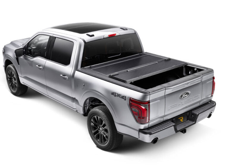 White Ford Ranger with 5-foot bed and BAKFlip G2 tonneau cover closed, front three-quarter view