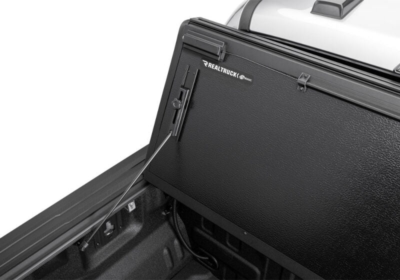Close-up of the BAKFlip G2 folded panel edge and bed rail interior on the 5-foot bed