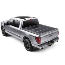 Load image into Gallery viewer, BAKFlip G2 tonneau cover closed on a white Ford Ranger 5-foot bed, rear three-quarter view