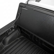 Load image into Gallery viewer, Close-up of the BAKFlip G2 folding panel hinge and bed rail interior