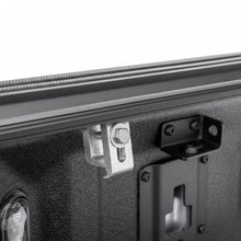 Load image into Gallery viewer, Close-up of the BAKFlip G2 bed rail clamp and mounting hardware