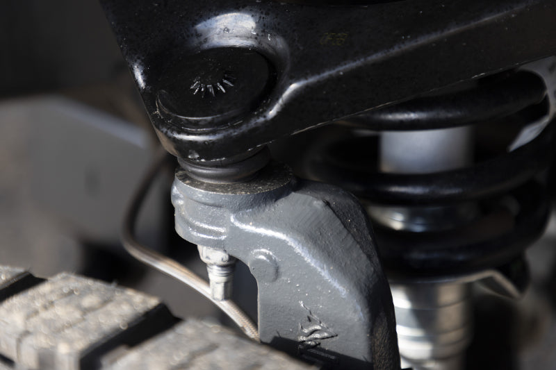 Belltech 6-8 inch lift kit installed on 2019-2025 Ram 1500 4WD showing lower control arm and coil - image 6 mounted component