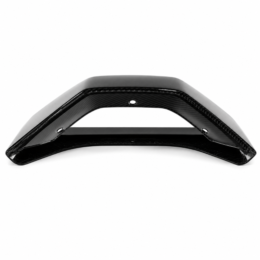 Rear profile of the carbon roof scoop inlet with the fastener holes across the mounting lip visible