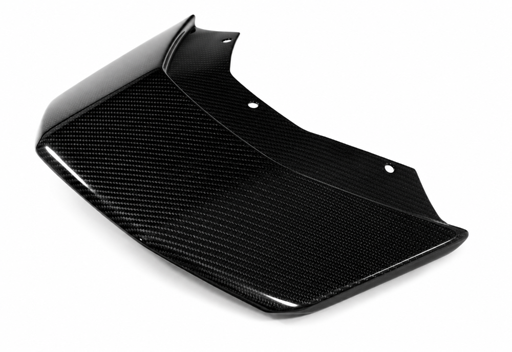 Wide angled view of the full twill carbon roof scoop inlet panel laid out to show its shape end to end