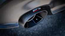 Load image into Gallery viewer, Close-up of a Borla carbon-fiber exhaust tip with black anodized inner core
