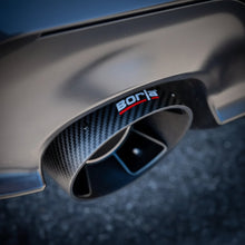 Load image into Gallery viewer, Close-up of a Borla carbon-fiber exhaust tip with black anodized inner core