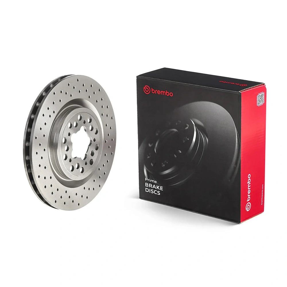 Brembo 09.7267.50 drilled brake disc with packaging on a white background