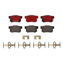Load image into Gallery viewer, Brembo P79027N rear brake pads and installation hardware detail