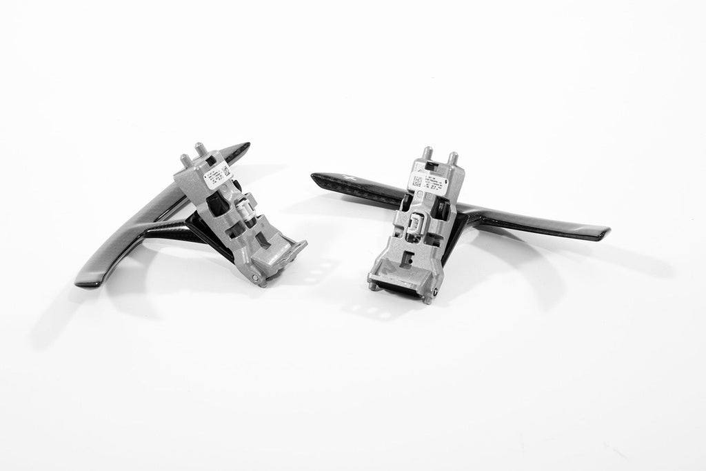 Porsche 991 carbon paddle shifter extensions on aluminium brackets positioned facing each other