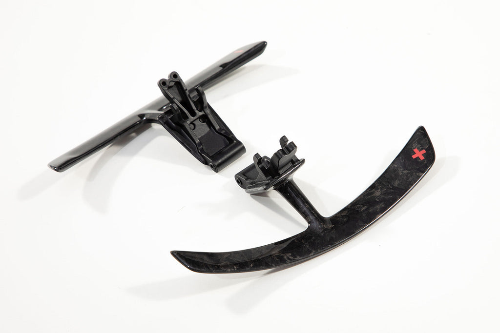Porsche 991 paddle shifter extensions in forged carbon showing the marbled non directional pattern