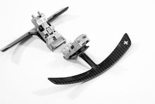 Load image into Gallery viewer, Porsche 991 carbon paddle shifter extensions on aluminium brackets with a white star badge on the paddle