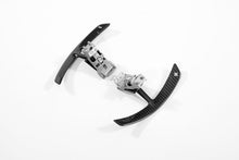 Load image into Gallery viewer, Detail of one Porsche 991 carbon paddle shifter extension showing the machined aluminium bracket and fasteners