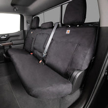Load image into Gallery viewer, Covercraft Carhartt Super Dux SeatSaver second row bench seat cover installed in Chevrolet Silverado, crew cab configuration