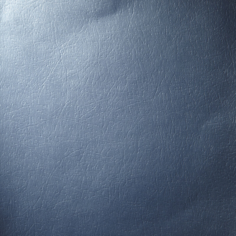 Close-up of the gray binding and foam core edge on the blue metallic Tacoma sunscreen