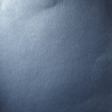 Load image into Gallery viewer, Close-up of the gray binding and foam core edge on the blue metallic Tacoma sunscreen