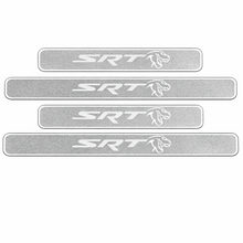Load image into Gallery viewer, Door sill plates installed in Dodge Ram interior