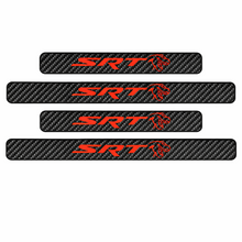 Load image into Gallery viewer, Close-up of SRT TRX design and carbon fiber finish