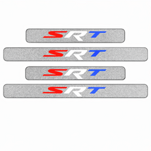 Load image into Gallery viewer, Close-up of SRT design and carbon fiber finish
