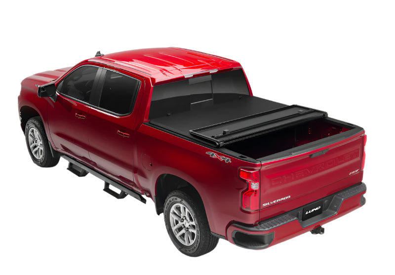 Lund 04-15 Nissan Titan (5.5ft. Bed) Hard Fold Tonneau Cover w/Bracket Kit - Black-Tonneau Covers - Hard Fold-LUND