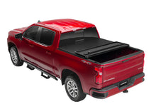 Load image into Gallery viewer, Lund 04-15 Nissan Titan (5.5ft. Bed) Hard Fold Tonneau Cover w/Bracket Kit - Black-Tonneau Covers - Hard Fold-LUND