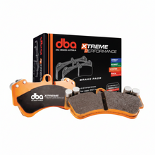 Load image into Gallery viewer, DBA DB15145XP Xtreme Performance front brake pad set with slotted friction faces and fitted shims