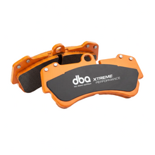 Load image into Gallery viewer, DBA DB15145XP Xtreme Performance front brake pad set with slotted friction faces and fitted shims, view 2