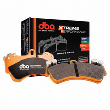 Load image into Gallery viewer, DBA DB2703XP Xtreme Performance rear brake pad set for Ram heavy duty trucks with slotted faces and shims
