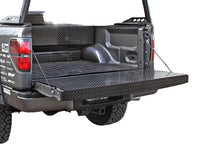 Load image into Gallery viewer, Side profile of Dee Zee black tailgate protector showing full coverage on Super Duty