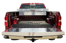 Load image into Gallery viewer, Ram truck tailgate with Dee Zee brite-tread cap during cargo loading