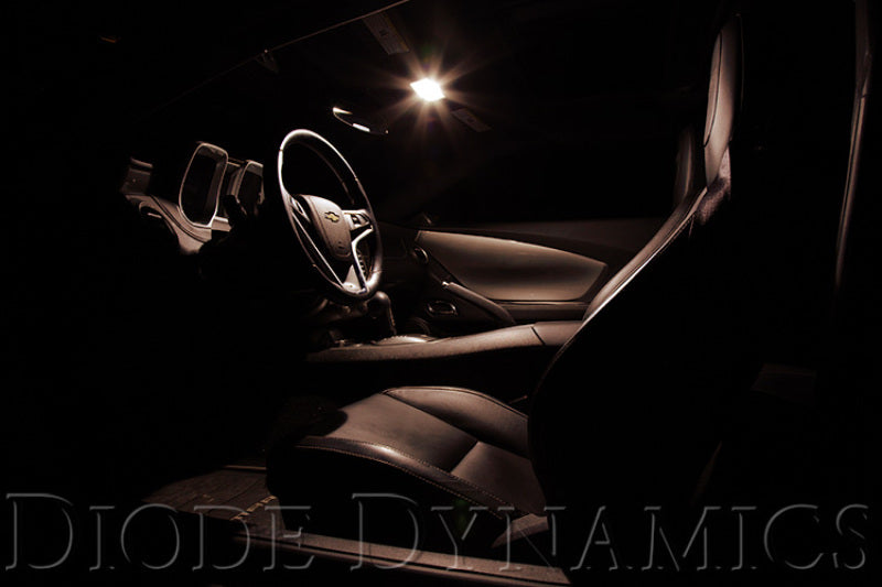Diode Dynamics HP5 LED Bulb emitting bright red light in housing