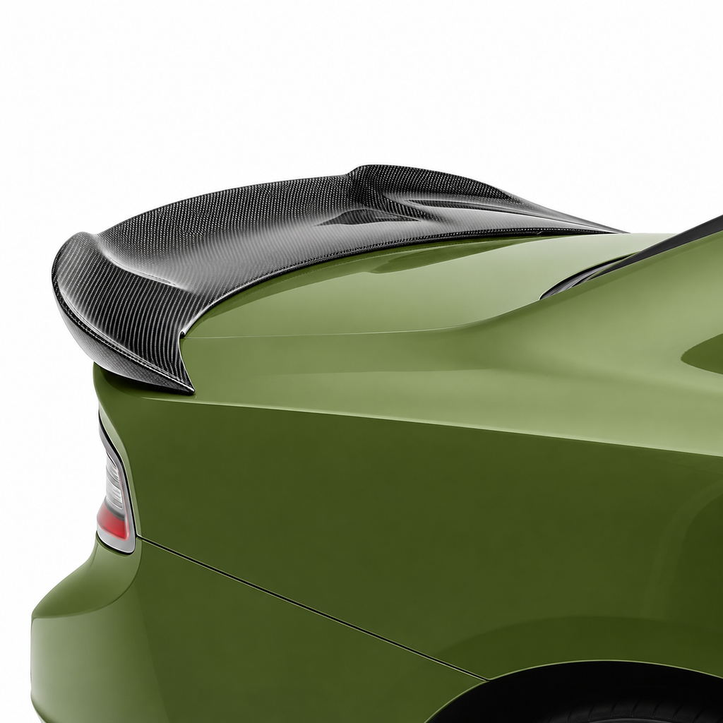 Gloss carbon fiber ducktail spoiler installed on 2015-2024 Dodge Charger