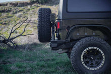 Load image into Gallery viewer, DV8 Offroad DV8 07-18 Jeep Wrangler (JK) Tire Carrier for MTO Bumper