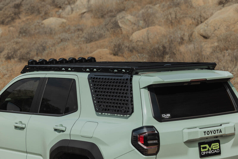 Driver-side view of the exterior window Molle panel on a white Toyota 4Runner