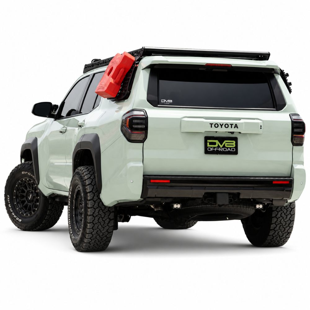 Rear view of white Toyota 4Runner with DV8 roof rack and driver-side Molle panel