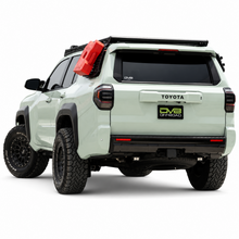 Load image into Gallery viewer, Rear view of white Toyota 4Runner with DV8 roof rack and driver-side Molle panel
