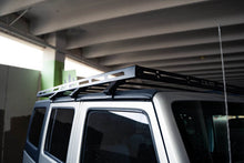 Load image into Gallery viewer, DV8 Offroad 07-18 Jeep Wrangler JK Full-Length Roof Rack - Black Ops Auto Works