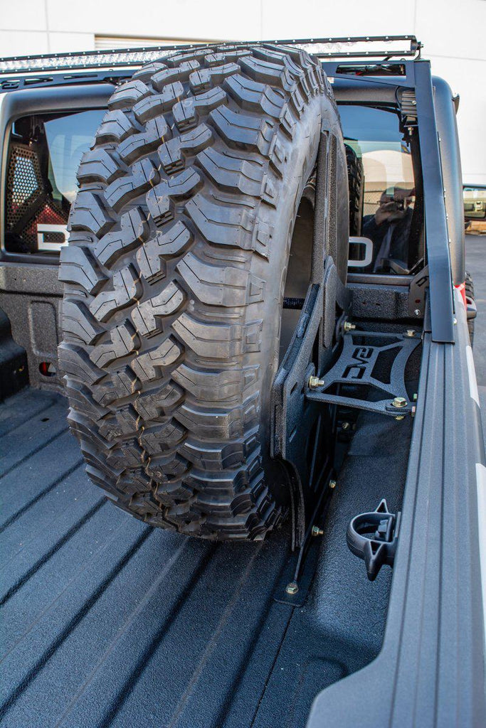 DV8 Offroad 2019+ Jeep Gladiator Universal Stand Up In-Bed Tire Carrier - Black Ops Auto Works