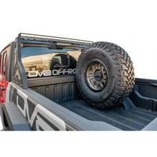Load image into Gallery viewer, DV8 Offroad 2019+ Jeep Gladiator Universal Stand Up In-Bed Tire Carrier - Black Ops Auto Works