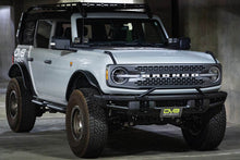 Load image into Gallery viewer, DV8 Offroad 21-22 Ford Bronco Factory Front Bumper Licence Relocation Bracket - Front - Black Ops Auto Works