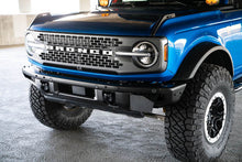 Load image into Gallery viewer, DV8 Offroad 21-22 Ford Bronco Factory Front Bumper License Relocation Bracket - Side - Black Ops Auto Works