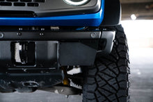 Load image into Gallery viewer, DV8 Offroad 21-22 Ford Bronco Factory Front Bumper License Relocation Bracket - Side - Black Ops Auto Works