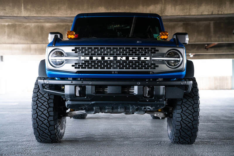 DV8 Offroad 21-22 Ford Bronco Factory Front Bumper License Relocation Bracket - Side - Black Ops Auto Works